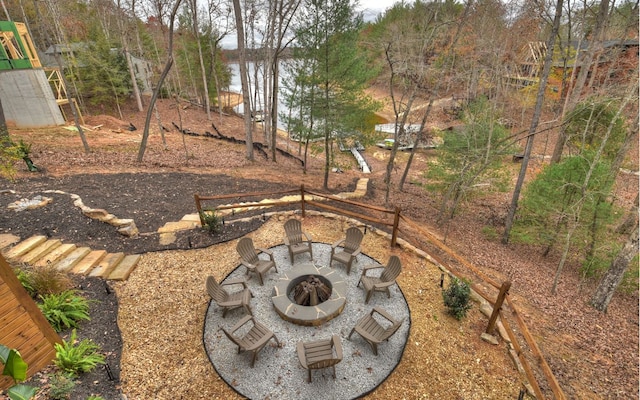 view of yard with a fire pit