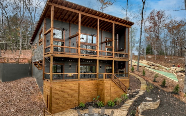 rear view of house featuring a balcony