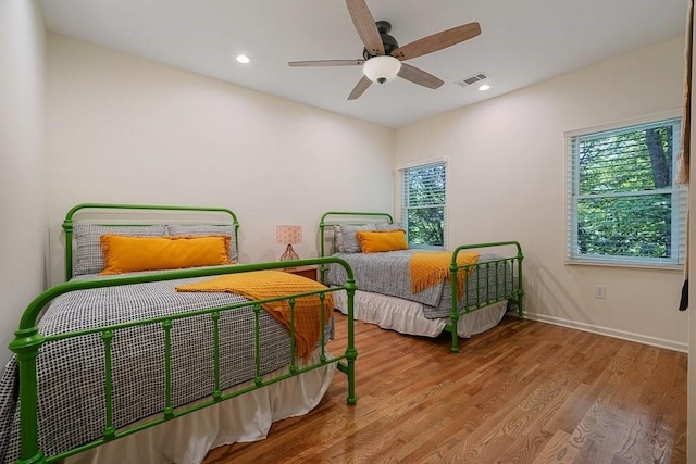 159 Cinnamon Fern Ln, Big Canoe, GA 30143 - bedroom featuring multiple windows, wood finished floors, a ceiling fan, baseboards, and recessed lighting