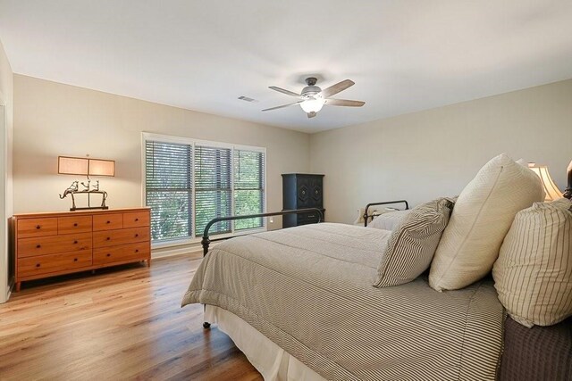 159 Cinnamon Fern Ln, Big Canoe, GA 30143 - bedroom with light wood-style flooring and ceiling fan
