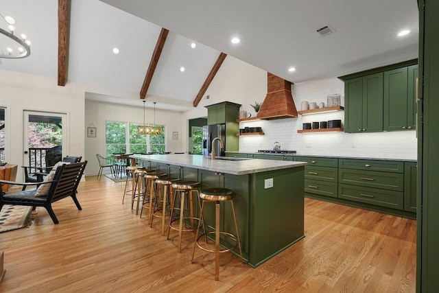 159 Cinnamon Fern Ln, Big Canoe, GA 30143 - kitchen featuring green cabinets, a chandelier, premium range hood, a sink, and high vaulted ceiling