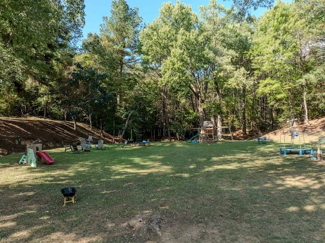 view of yard featuring playground community