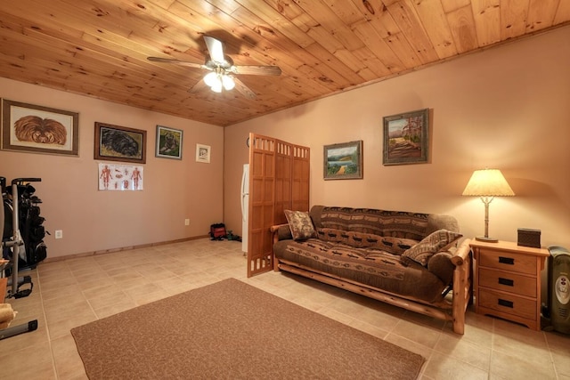 tiled living room featuring ceiling fan and wood ceiling