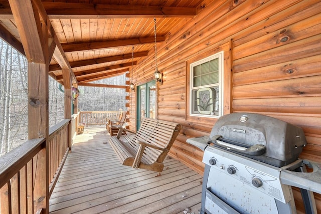 wooden terrace with grilling area