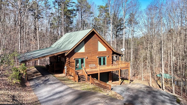 view of front of house featuring a wooden deck