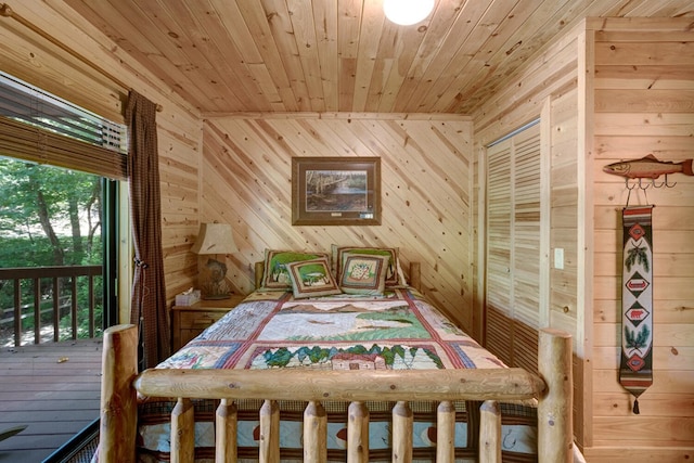 unfurnished bedroom with wood ceiling, wood walls, and a closet