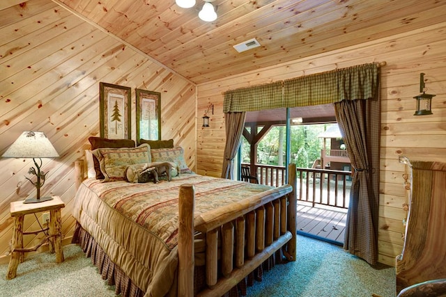 carpeted bedroom with wooden ceiling, lofted ceiling, wooden walls, and access to exterior