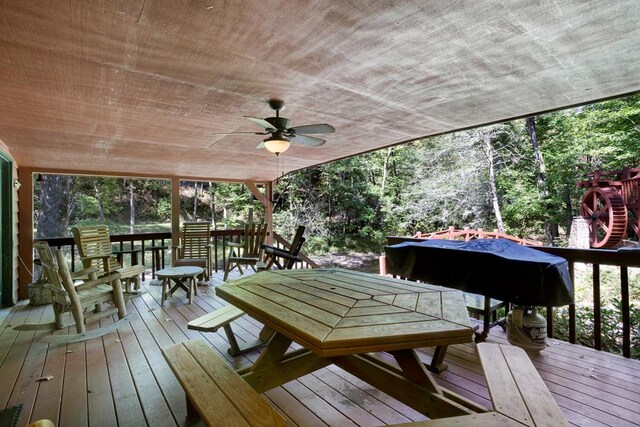 wooden deck with ceiling fan