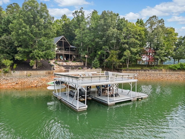 dock area featuring a water view and boat lift