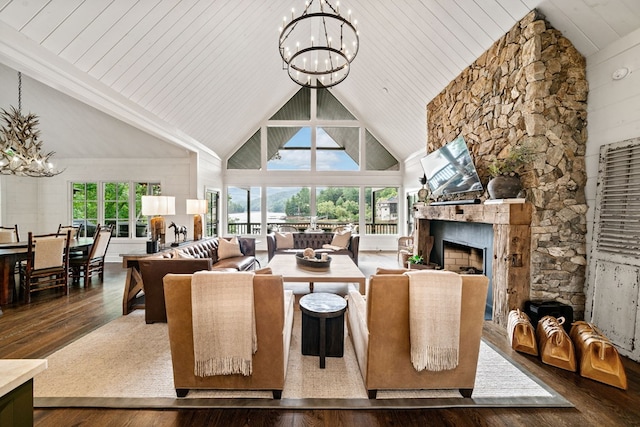 living room with high vaulted ceiling, hardwood / wood-style floors, a fireplace, wood ceiling, and a chandelier