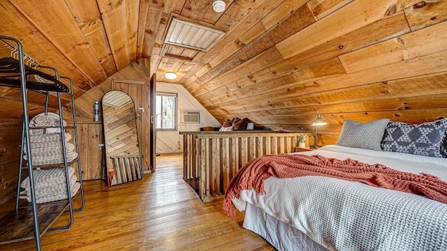 bedroom with wood-type flooring, vaulted ceiling, wooden ceiling, and wooden walls