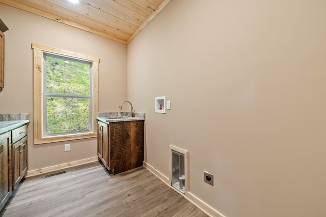 241 Lemmon Ln, Ellijay, GA 30540 - laundry room featuring cabinet space, hookup for an electric dryer, wooden ceiling, light wood-type flooring, and washer hookup