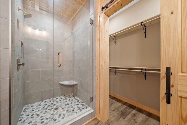 241 Lemmon Ln, Ellijay, GA 30540 - full bath featuring wood finished floors, a spacious closet, and a shower stall