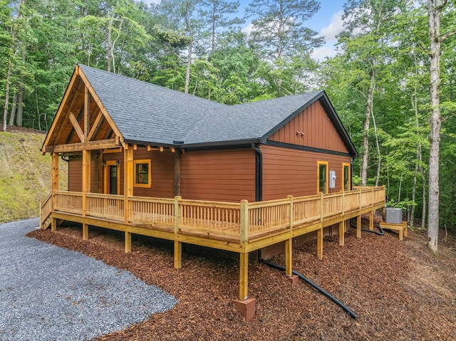 241 Lemmon Ln, Ellijay, GA 30540 - view of front of property featuring a shingled roof, a deck, and board and batten siding