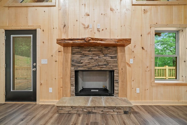 241 Lemmon Ln, Ellijay, GA 30540 - detailed view of wood finished floors, wood walls, and a fireplace