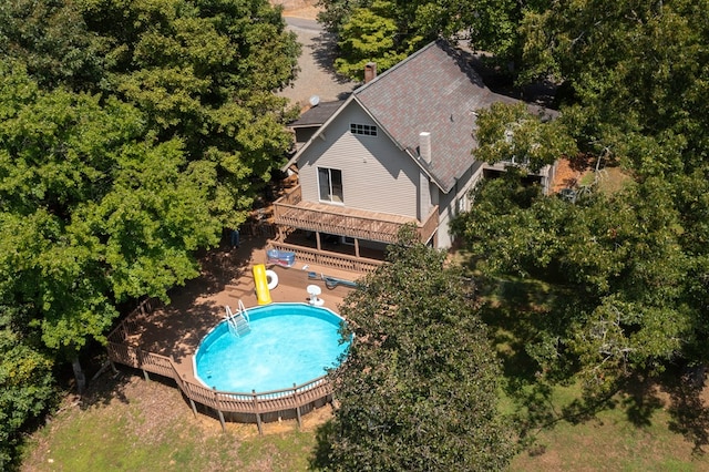 view of pool with a patio and a deck