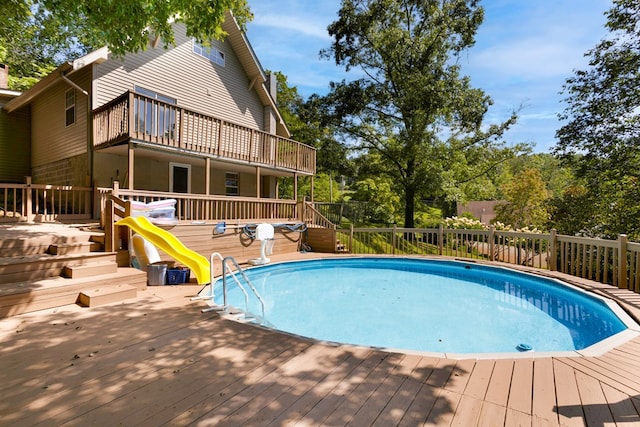 view of pool featuring a wooden deck