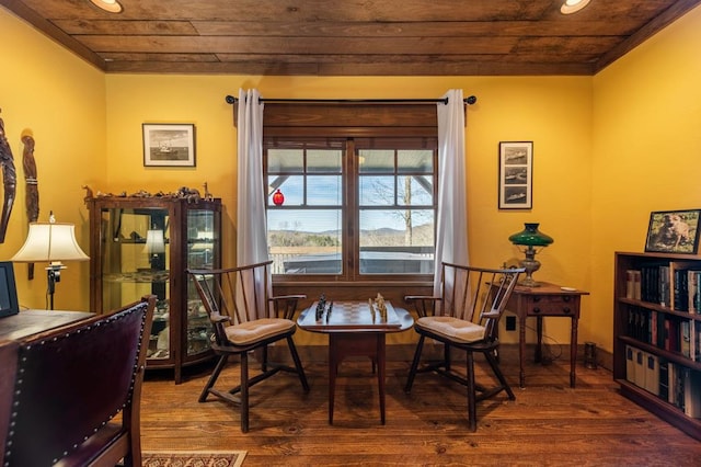 living area with recessed lighting, ornamental molding, wooden ceiling, and wood finished floors