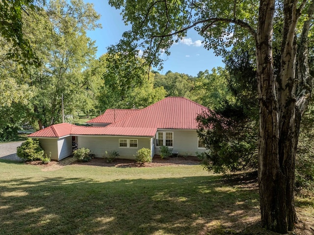 exterior space with a yard