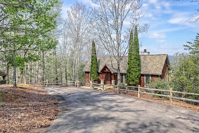 444 Wild Turkey, Tiger, GA 30576 - chalet / cabin featuring fence, a chimney, roof with shingles, and aphalt driveway