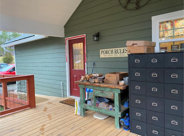 wooden terrace featuring mail boxes