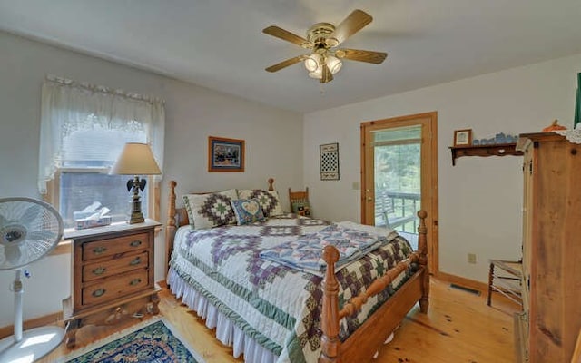 bedroom featuring ceiling fan, access to exterior, and light hardwood / wood-style floors