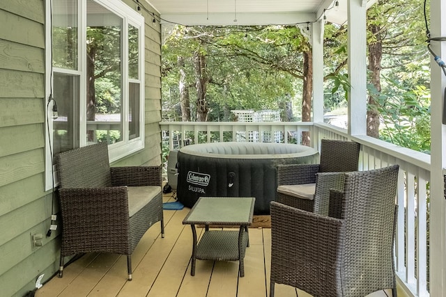 sunroom / solarium featuring a healthy amount of sunlight