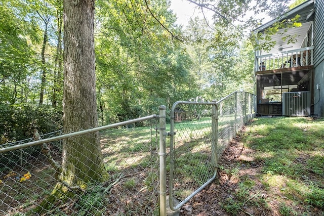 view of yard featuring a gate and fence