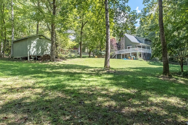 view of yard featuring a deck