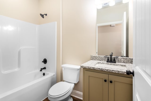 bathroom with vanity, toilet, and washtub / shower combination