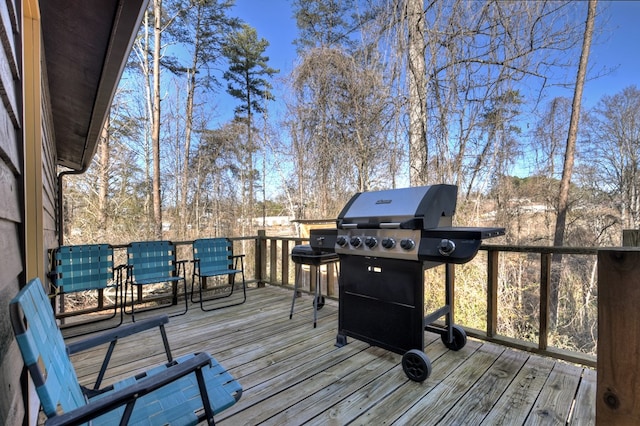 wooden terrace with area for grilling