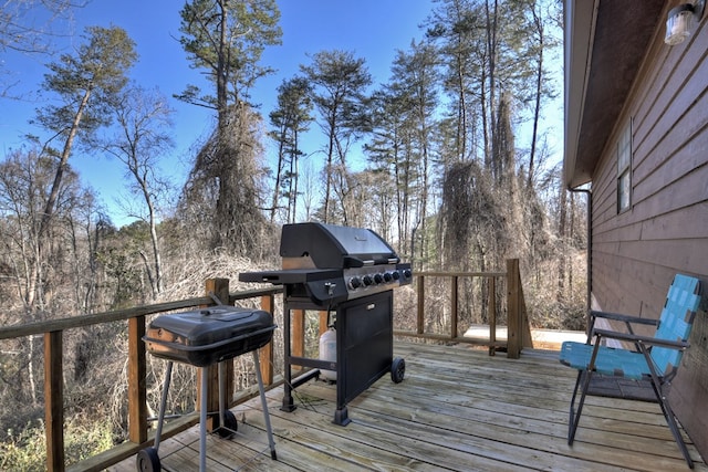 wooden terrace with grilling area