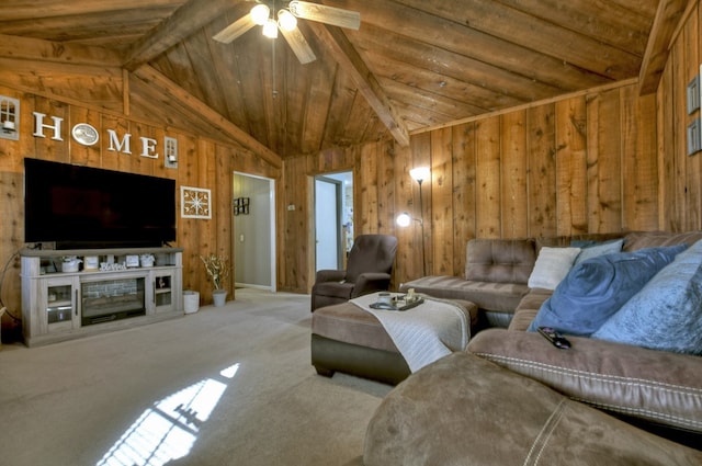 living room with wood walls, lofted ceiling with beams, carpet, wood ceiling, and ceiling fan