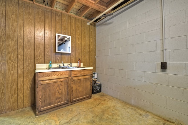 bathroom with concrete flooring and vanity