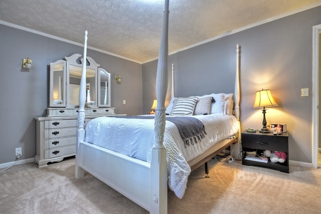 carpeted bedroom featuring ornamental molding and a textured ceiling