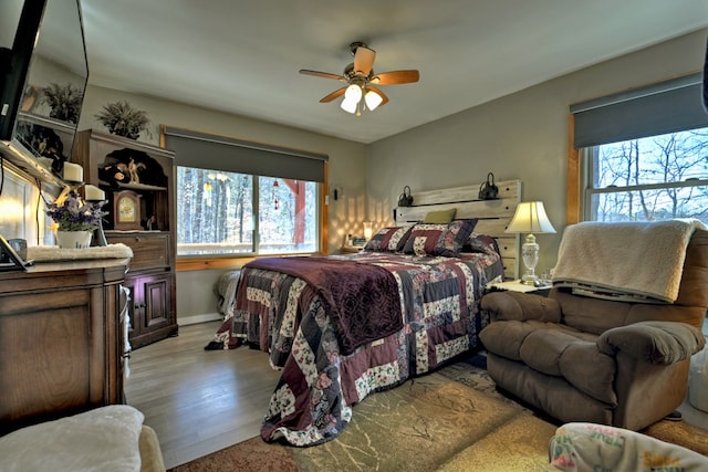 bedroom featuring ceiling fan and light wood-type flooring