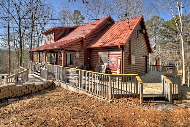 exterior space featuring a wooden deck