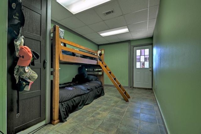 bedroom with a drop ceiling