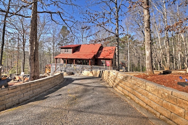 log cabin with a porch