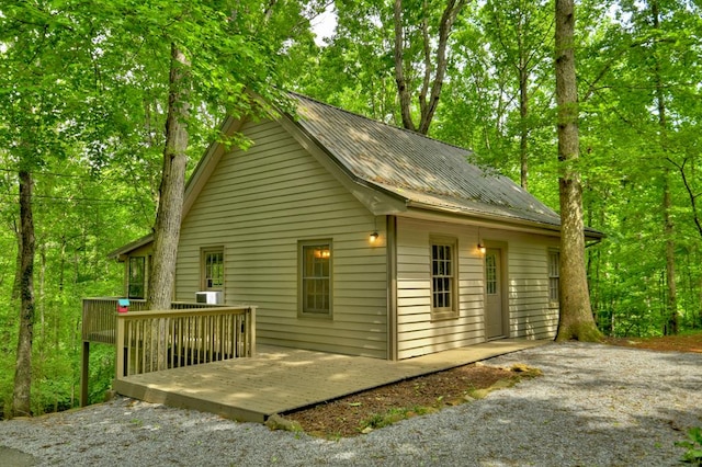 view of home's exterior with a deck