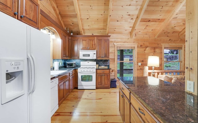 kitchen with vaulted ceiling with beams, wooden ceiling, white appliances, and light wood-type flooring