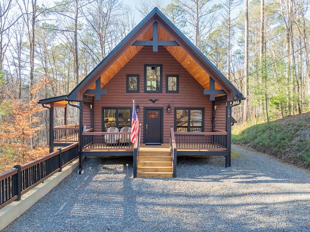 log home with covered porch