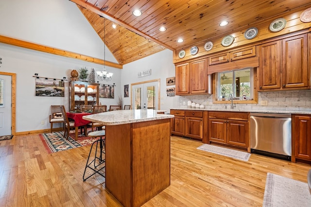 kitchen featuring a kitchen island, pendant lighting, stainless steel dishwasher, wood ceiling, and french doors