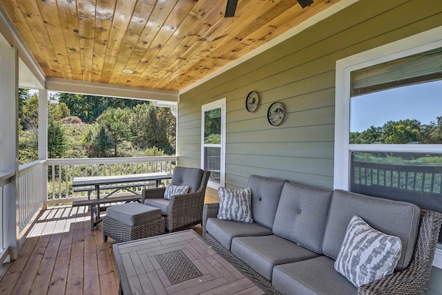 deck featuring outdoor lounge area