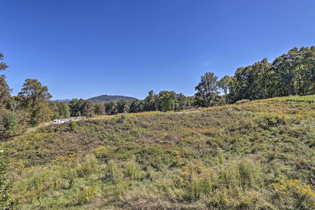 view of mountain feature featuring a rural view