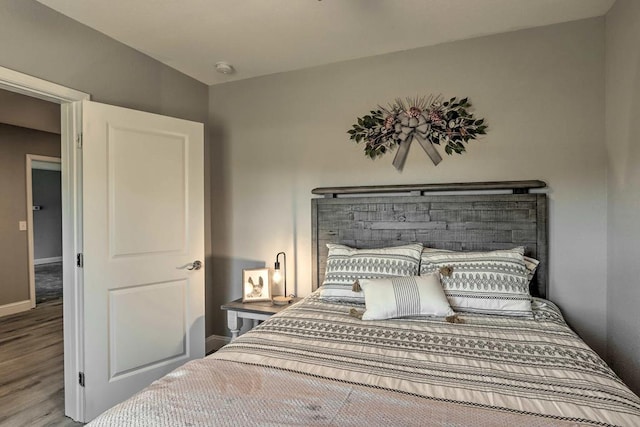 bedroom with light hardwood / wood-style floors