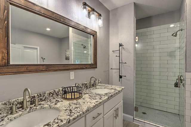 bathroom with vanity and walk in shower