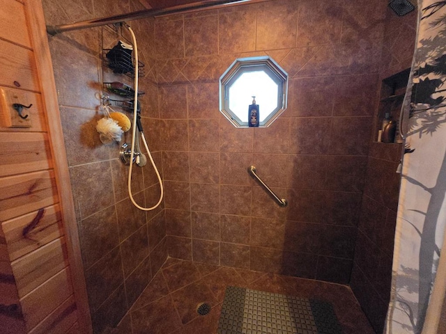 bathroom featuring a shower with curtain