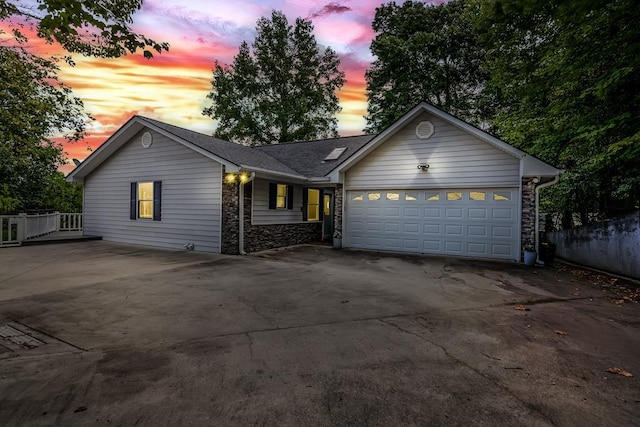 ranch-style home with a garage