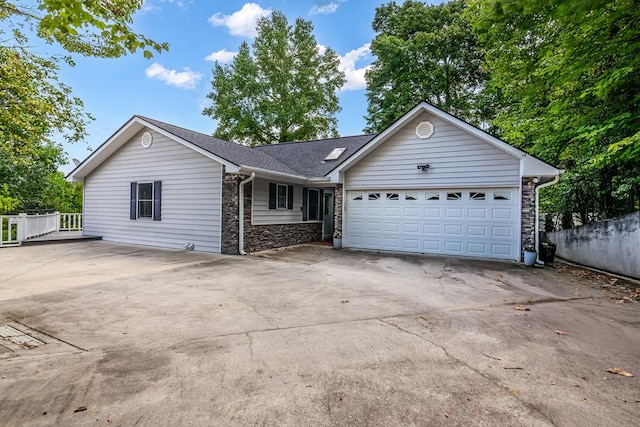 single story home with a garage